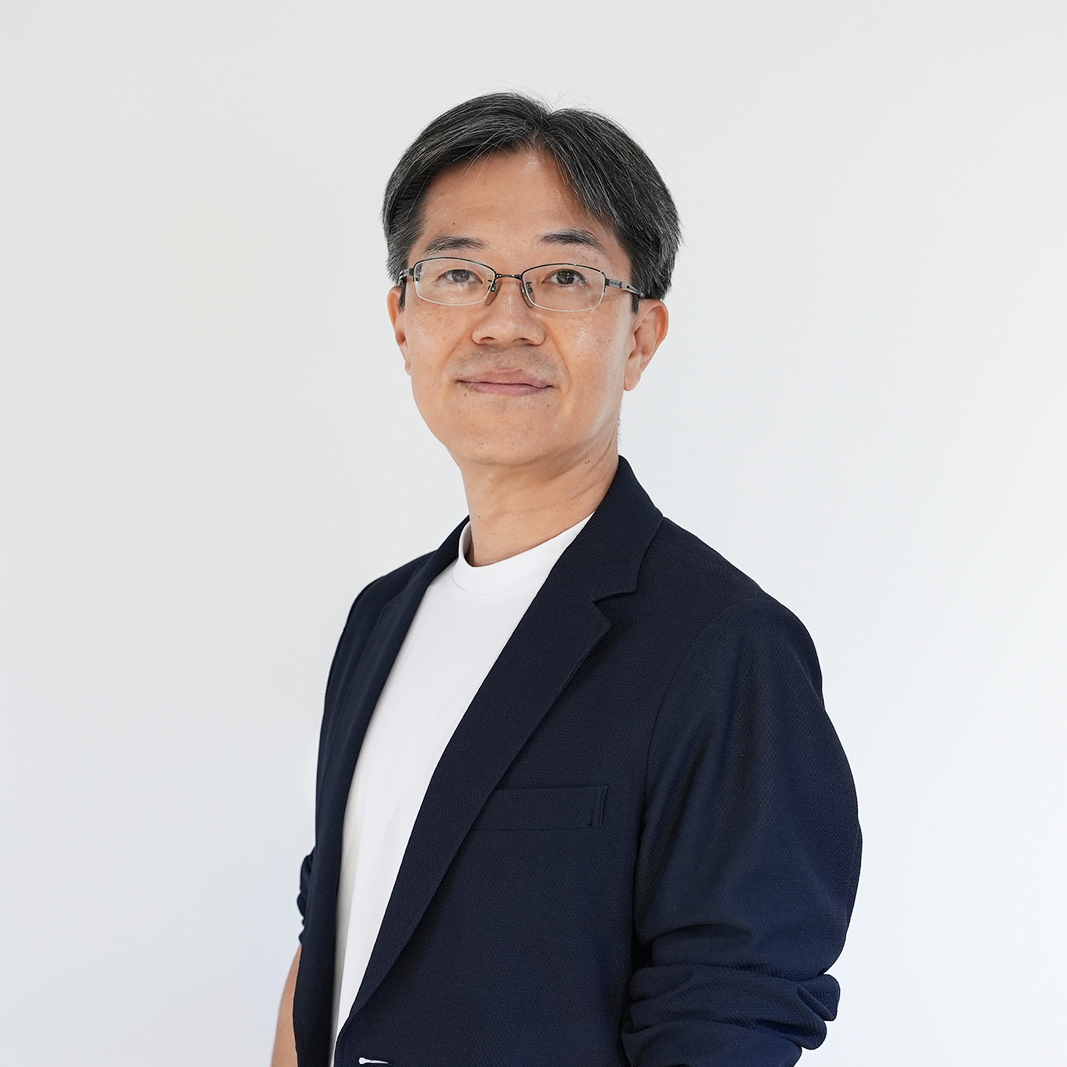 Director 髙橋 謙一